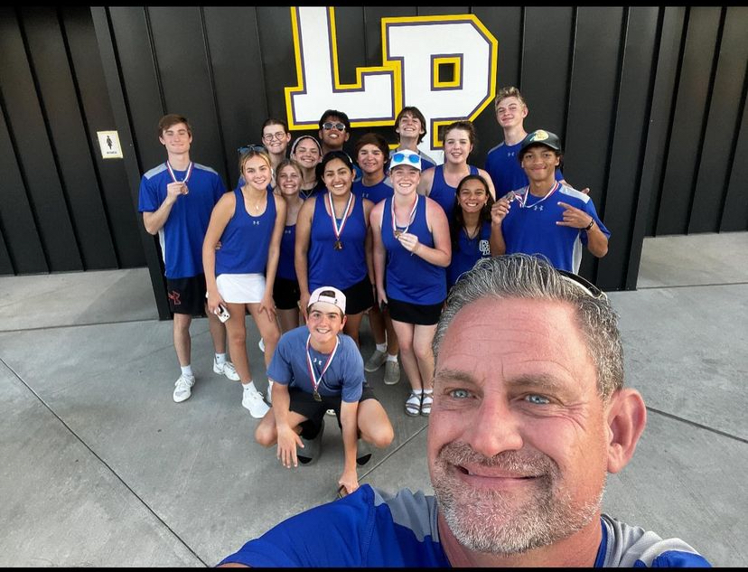 Varsity tennis competes in tourney