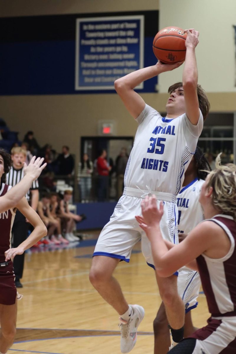 Senior Mason Levings shoots for the Blue Devils.