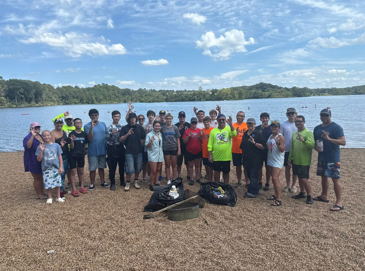 CHHS students and community members clean up Lake Naconiche.