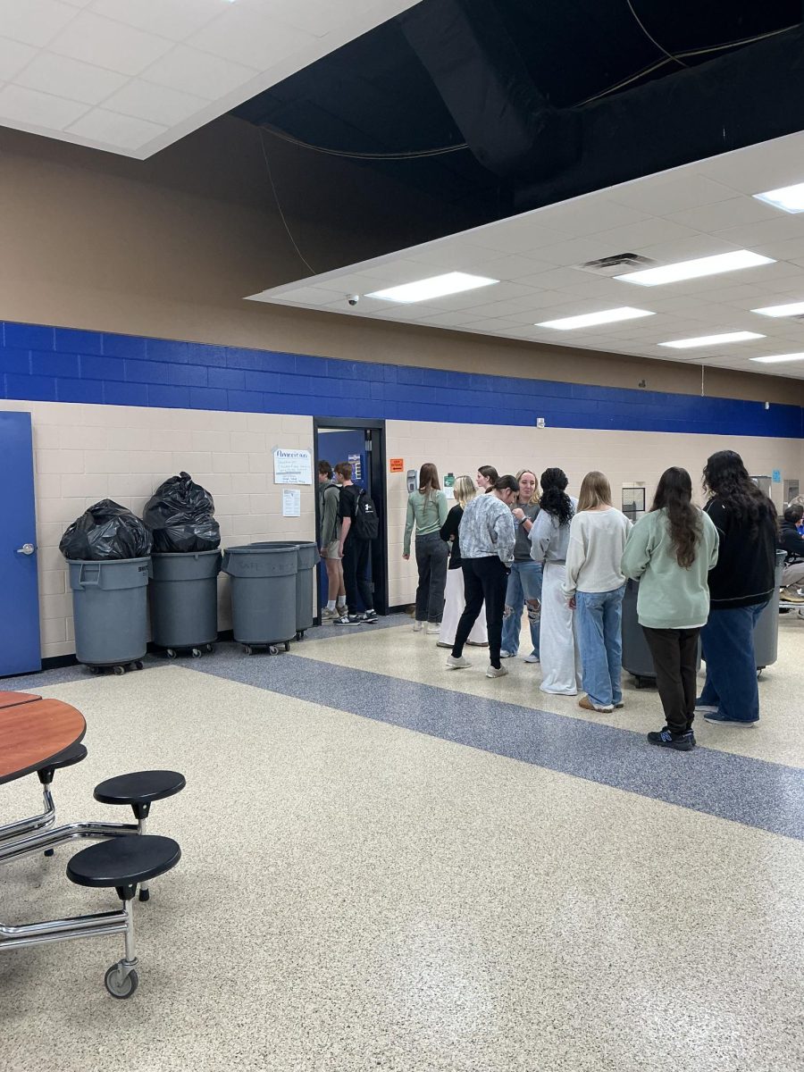 High school students wait for lunch in the new "American" food line.