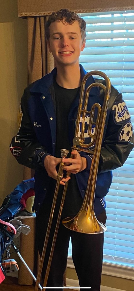 Junior Ben Poston advances to state in band.